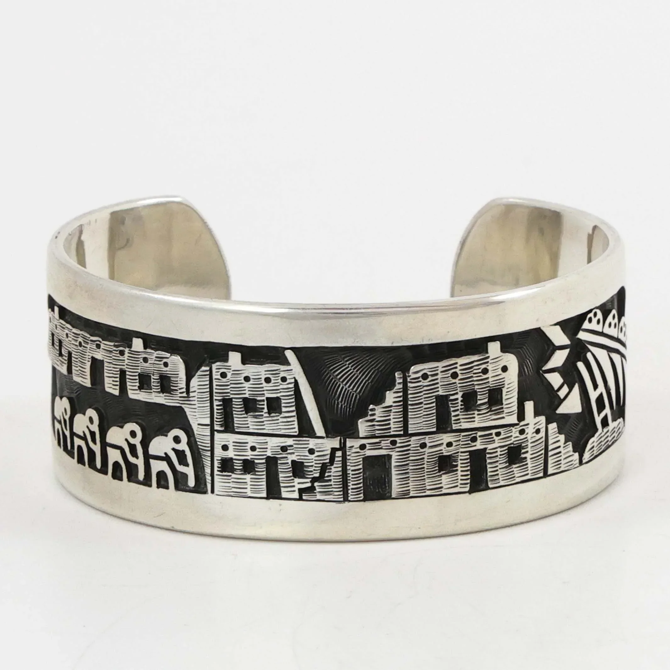 Flute Player and Village Cuff